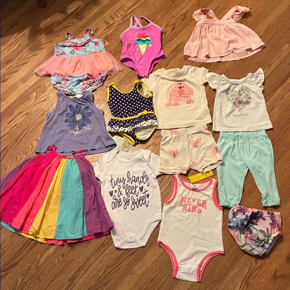 Colorful Baby Clothing Set. Includes Rompers, Onesies, Pjs, Swimsuits, & Dress.